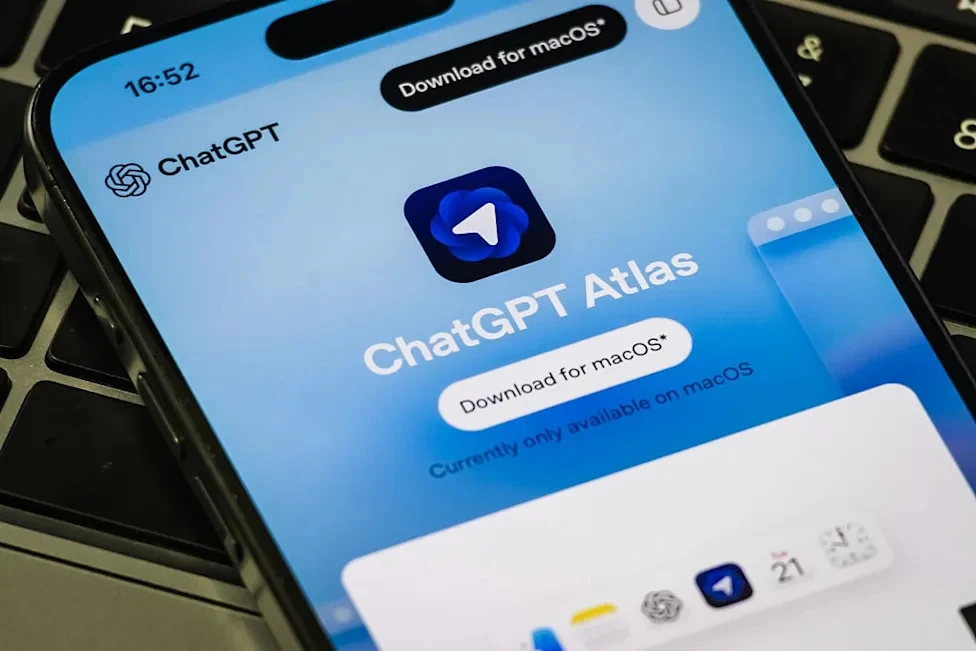 A phone showing the ChatGPT Atlas download page from OpenAI