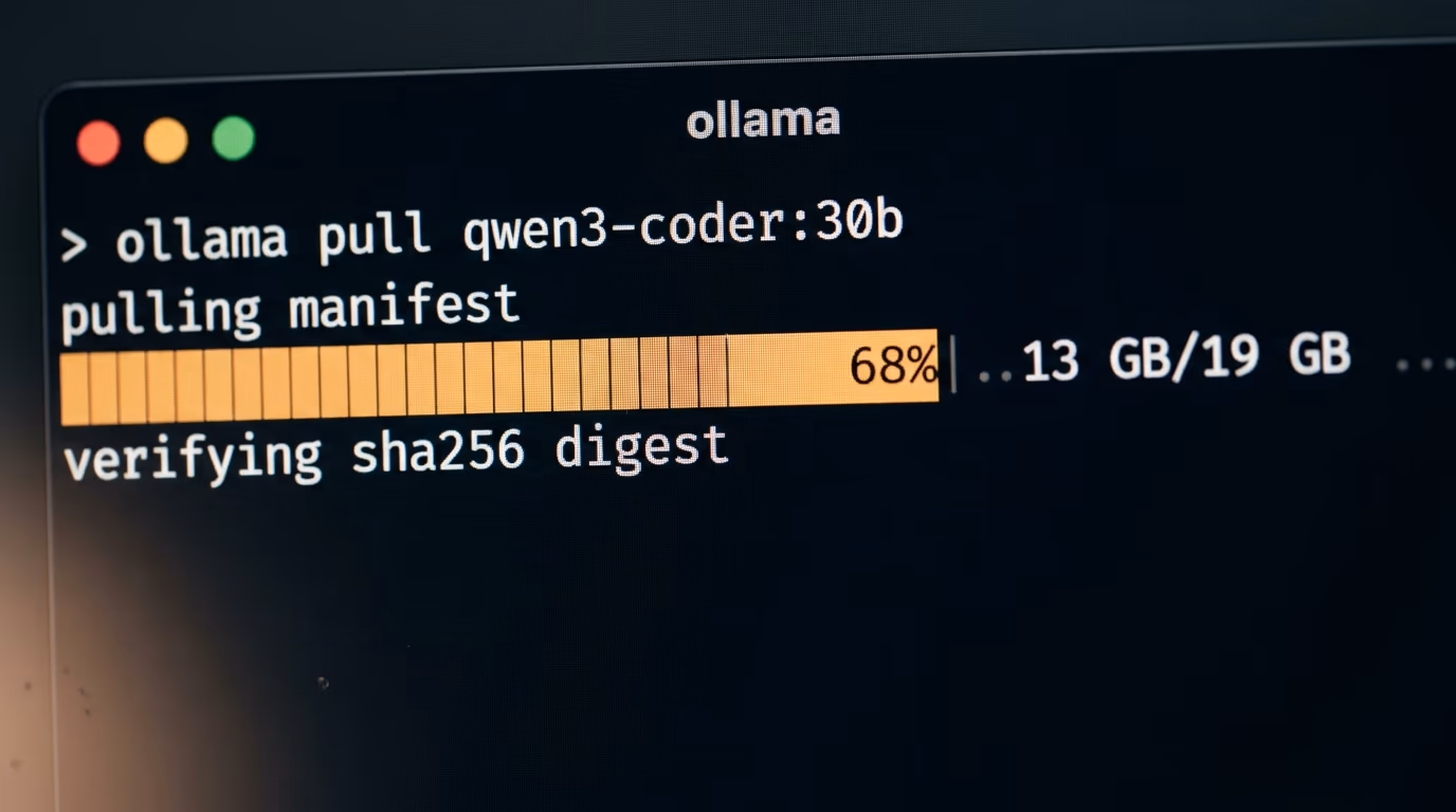 Installing a local coding model, an Ollama pull command running in a terminal