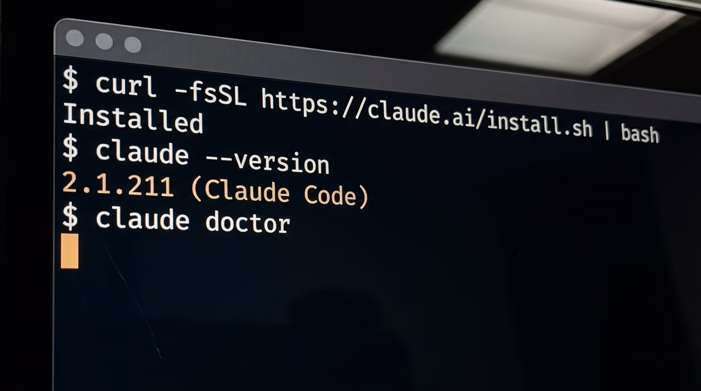 A terminal showing the Claude Code install command and the version output