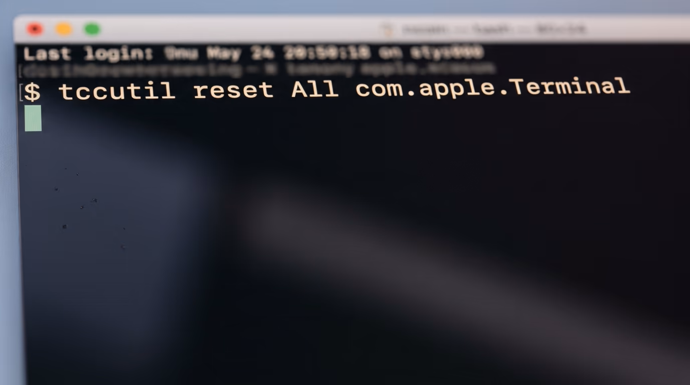 A Mac terminal running the tccutil command that clears stored permission decisions for Terminal