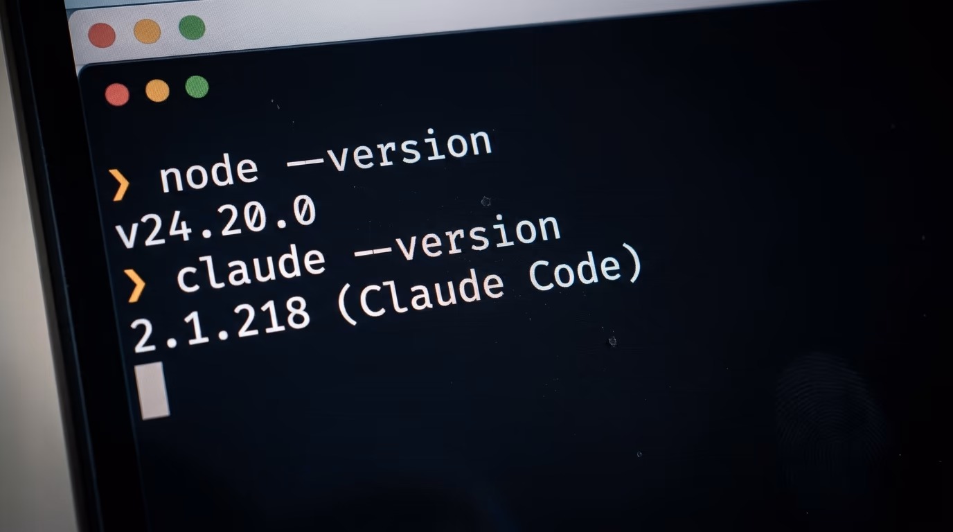 Terminal showing the node version and claude version commands with their output