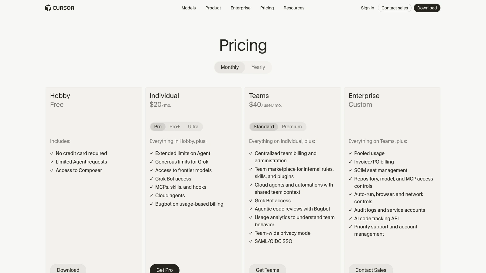 Cursor pricing page showing Hobby, Individual, Teams and Enterprise plans with Grok named in the features