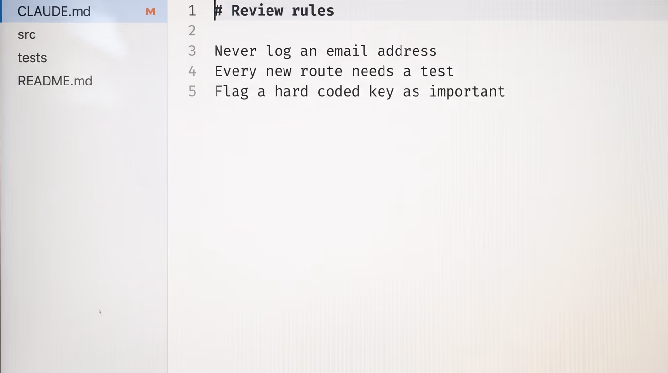 A CLAUDE.md file open in an editor with 3 short review rules under a Review rules heading