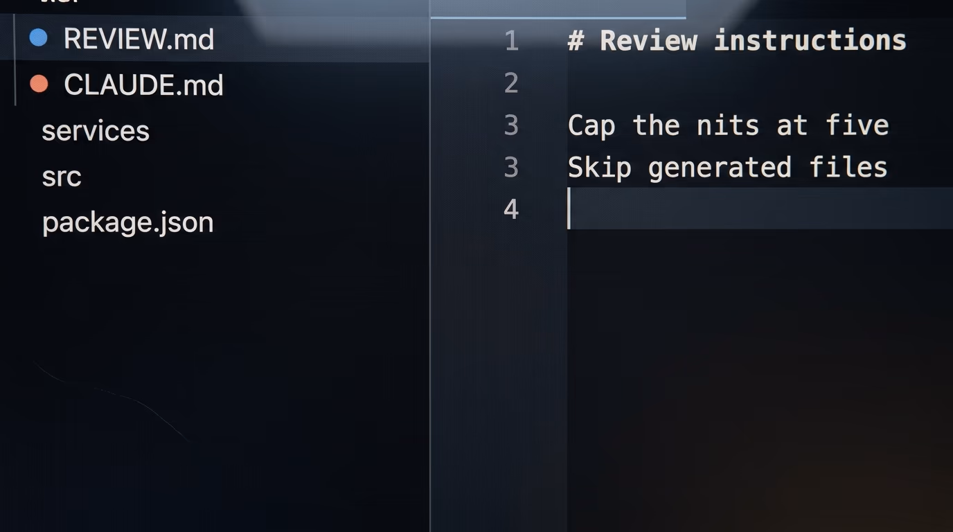 A repository file tree showing REVIEW.md above CLAUDE.md, with REVIEW.md open in the editor