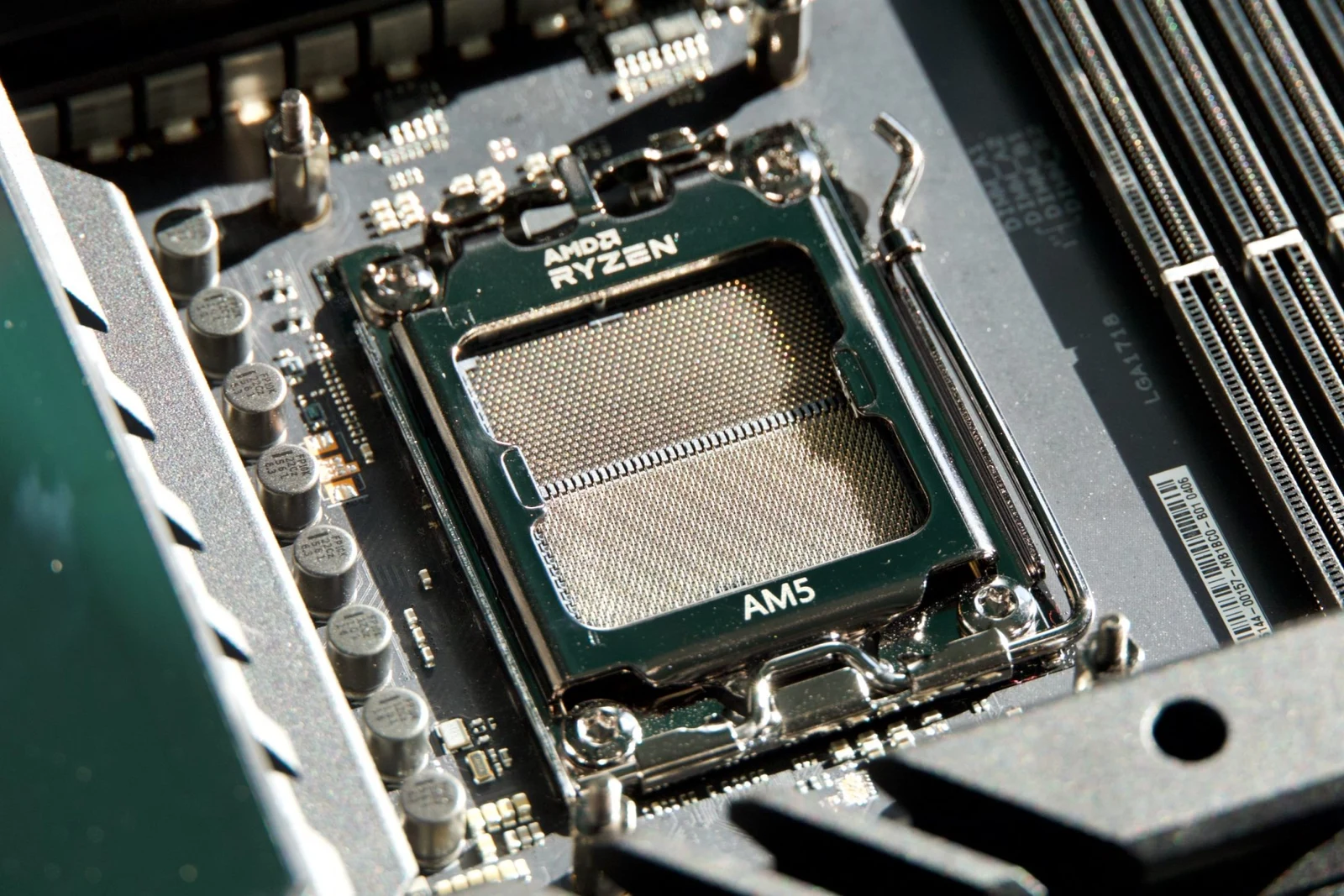 AMD Ryzen AM5 CPU socket on a motherboard, 16 cores against thousands of GPU cores